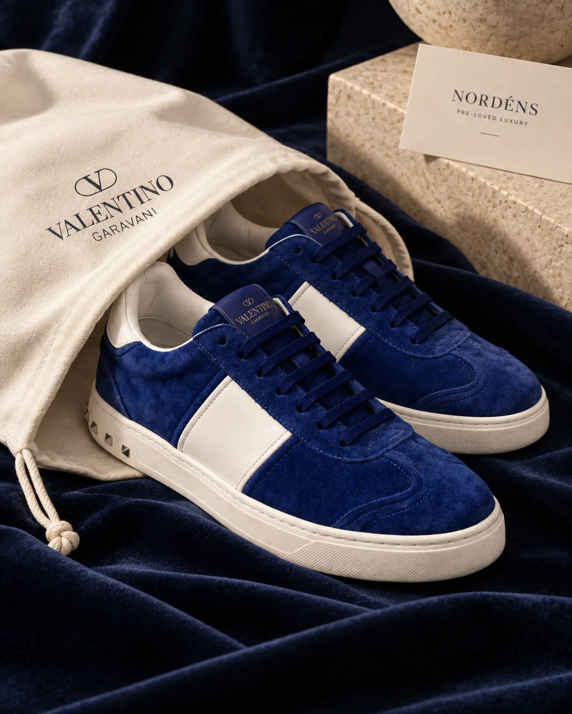Designer box on navy textile